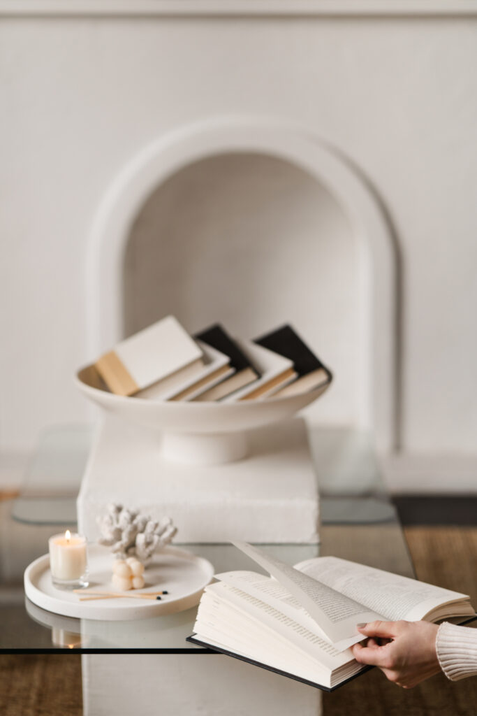 stack of books on a coffee table